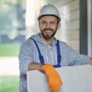 portrait-of-handsome-young-male-builder-in-hard-hat-looking-positive-300x200